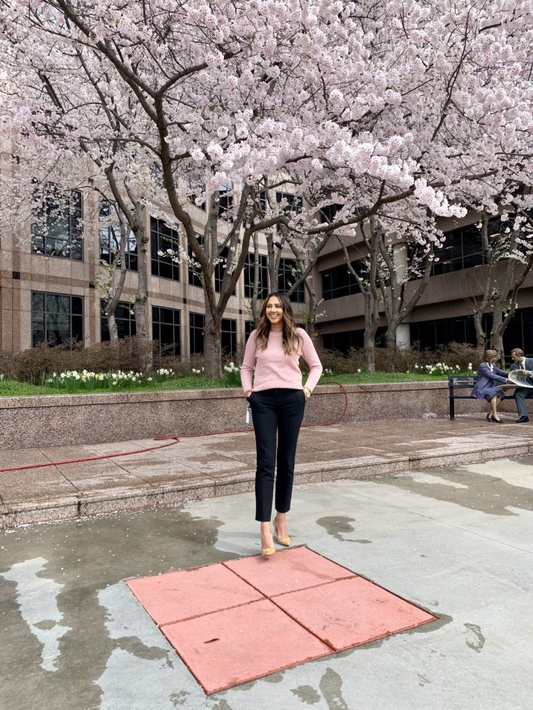 A casual spring outfit featuring items from Loft, Abercrombie, and Tory Burch. Loft Marled Tie Back Sweater in Pressed Petal, Ann Taylor Devin Pants in Black, Zara nude Heels.