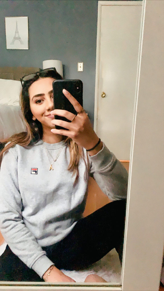 How to style loungewear and other basics such as sweatpants and hoodies during COVID19 by top US Punjabi Blog, The Pink Patola. Wearing a Fila Crewneck from costco and black H&M Joggers. Loungewear 2020 | Cute sweats | Sweatpant Outfits | WFH uniform | how to dress up sweats