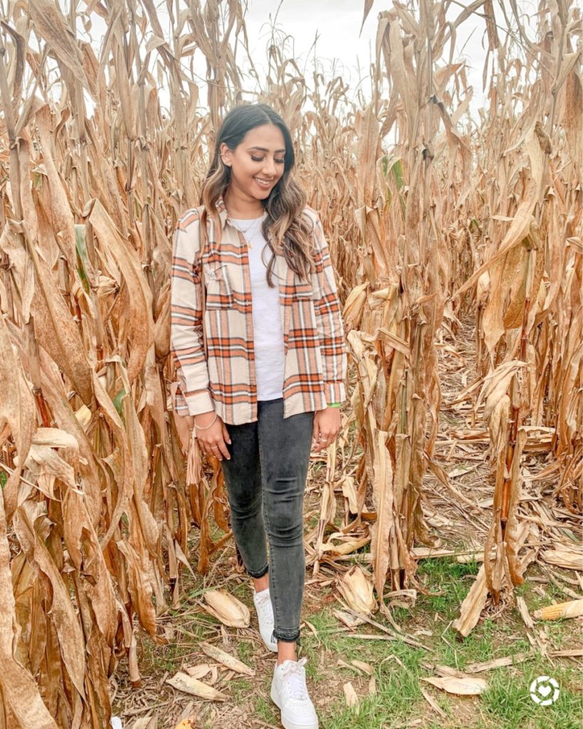 Top US Blog, The Pink Patola wearing a Target Flannel, Old Navy Crewneck tee, Abercrombie Jeans and Airforces for a cute yet comfy pumpkin patch look | Fall 2020 outfits, fall 2020 activities, corn field, what to wear to a cornfield pumpkin patch